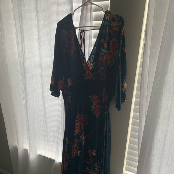 Navy floral dress. Worn two a couple weddings. Washes well. Comfortable. - Picture 1 of 1